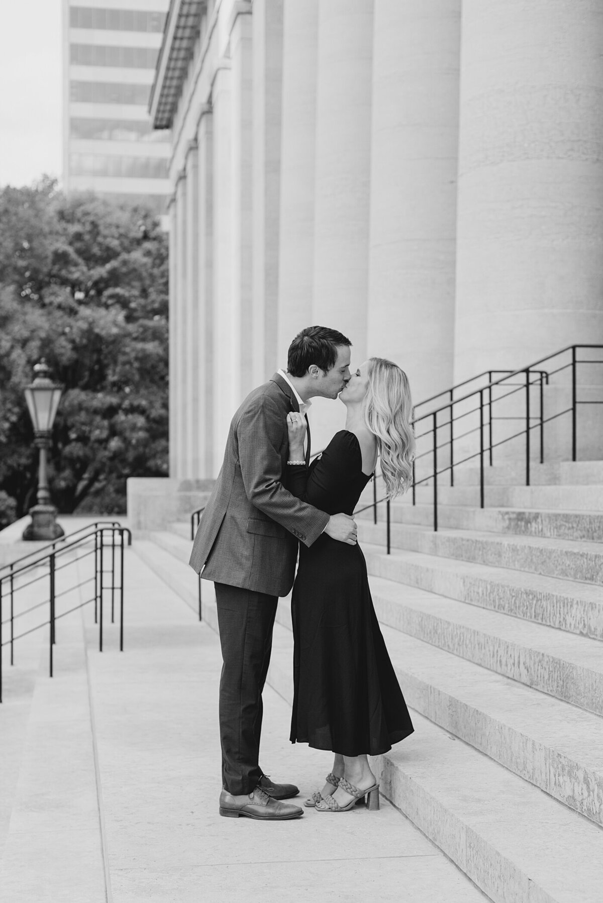 Couple kissing on steps of Ohio State House photographed by the Best Columbus, Ohio Wedding Photogrpaher
