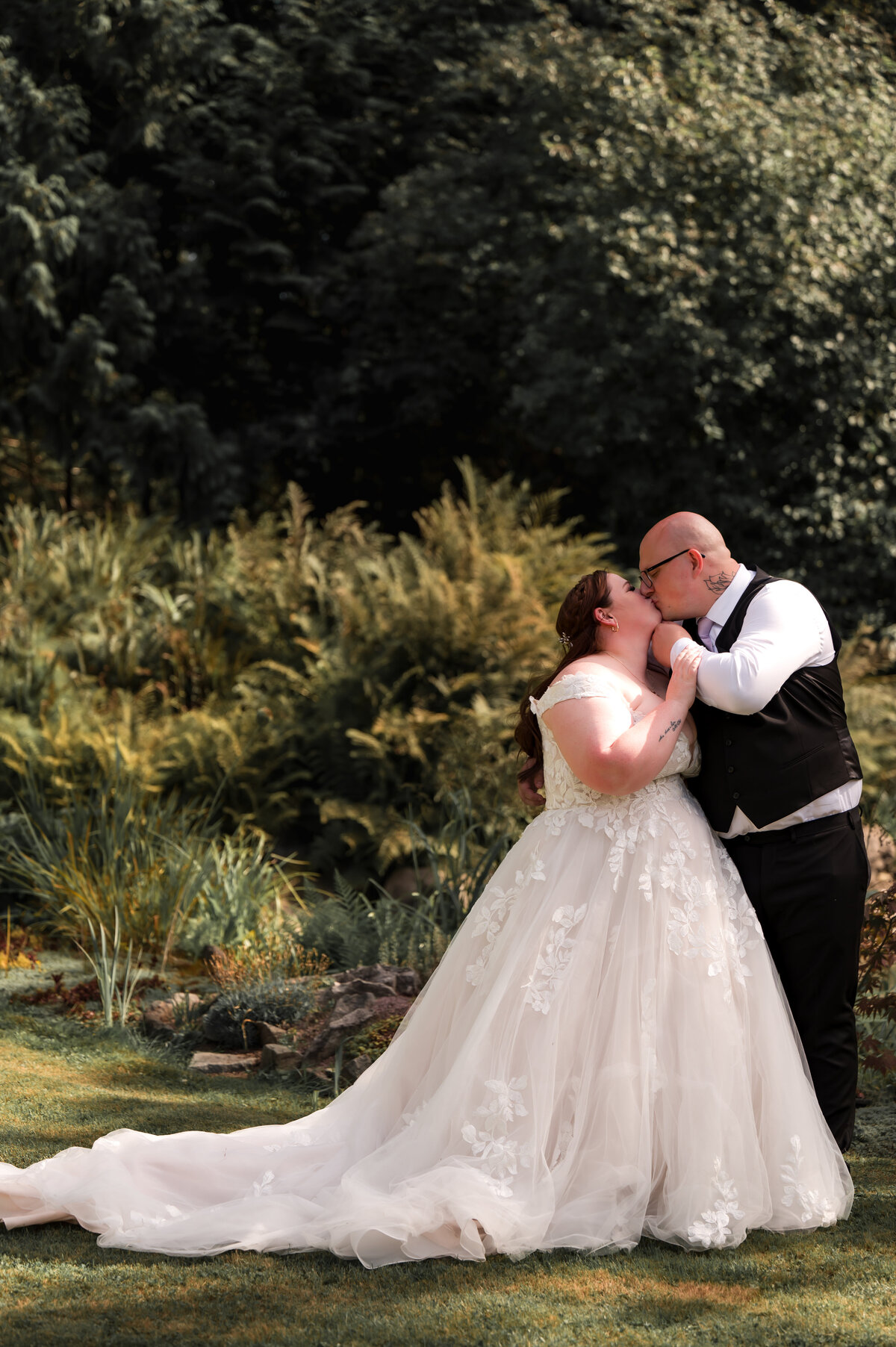 bride and groom in lushous BC forest on their wedding day