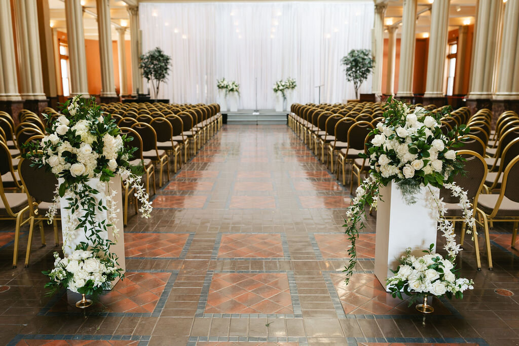 grooms inside landmark center