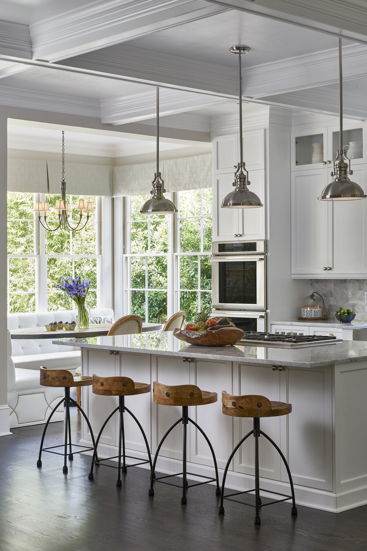 Elegant White Kitchen with Drop Lights + Breakfast Stools