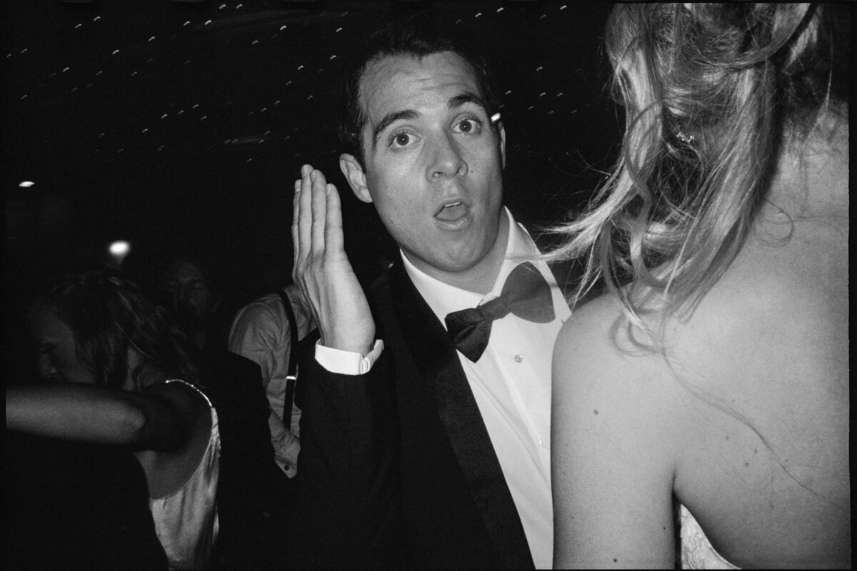 Groom having fun on the dance floor at Tappan Hill Mansion shot on 35mm film