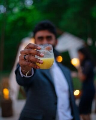 groom toasting picture from reception PixMemora studio photography