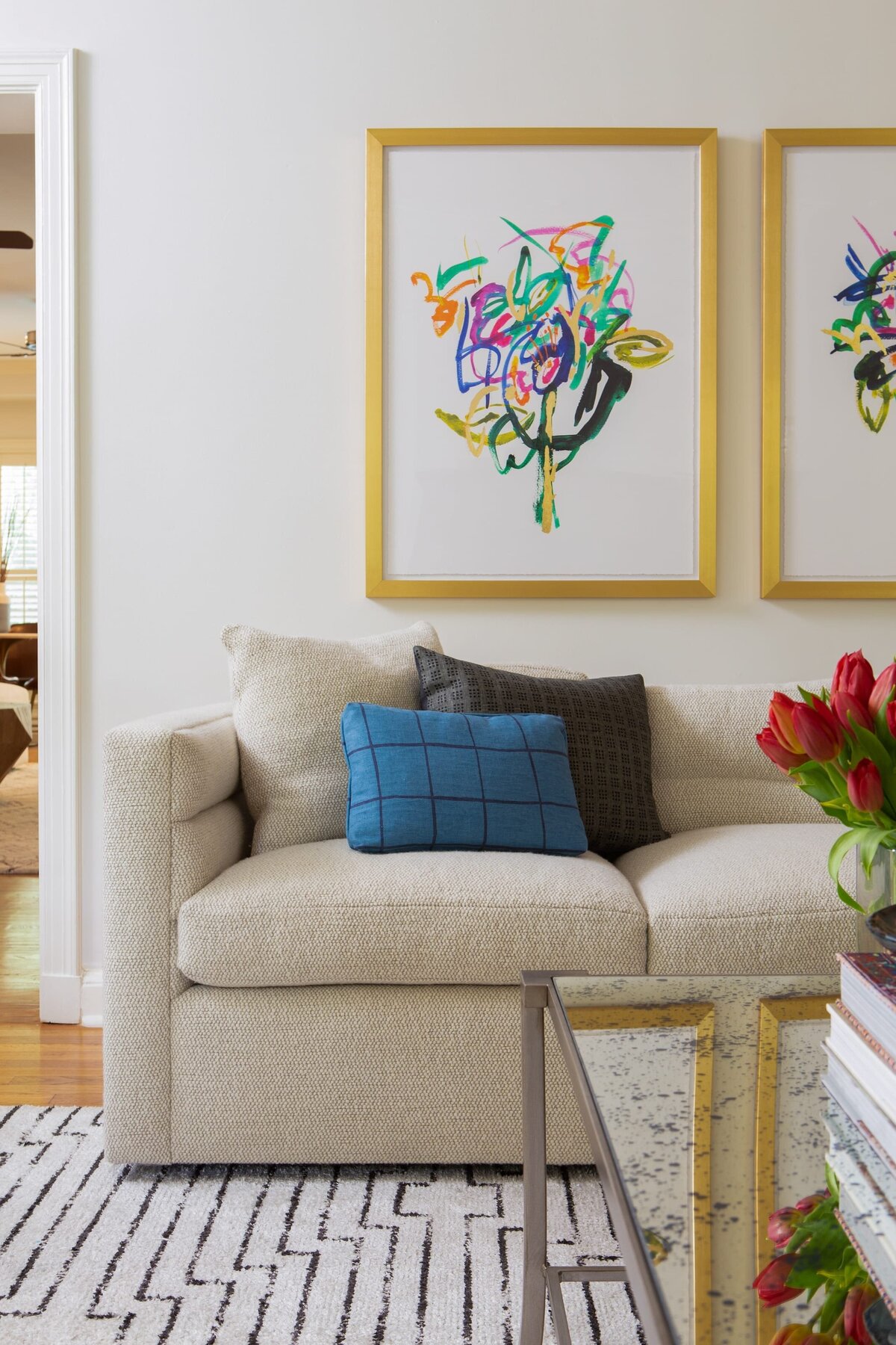 the keeping room interiors alta living room sofa with striped rug and cream sofa