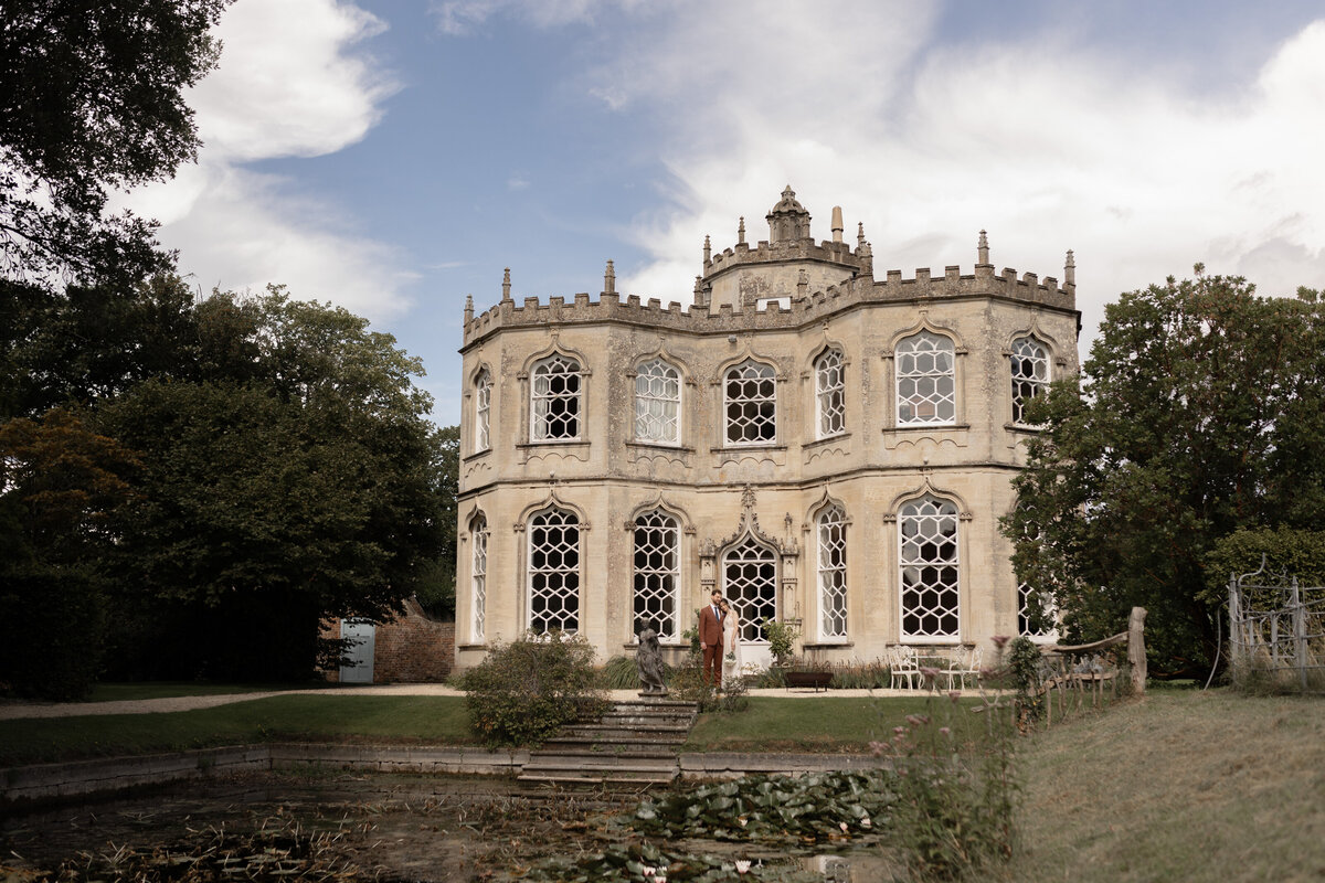 Editorial bridal portraits against a backdrop of the Orangery at Frampton Court Estate, Gloucestershire