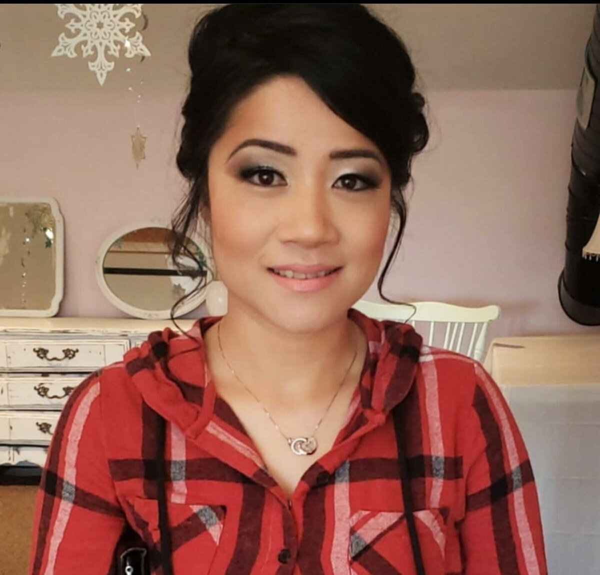 Final touch-up shot with bride’s radiant, flawless complexion – makeup by Lyds Makeup.