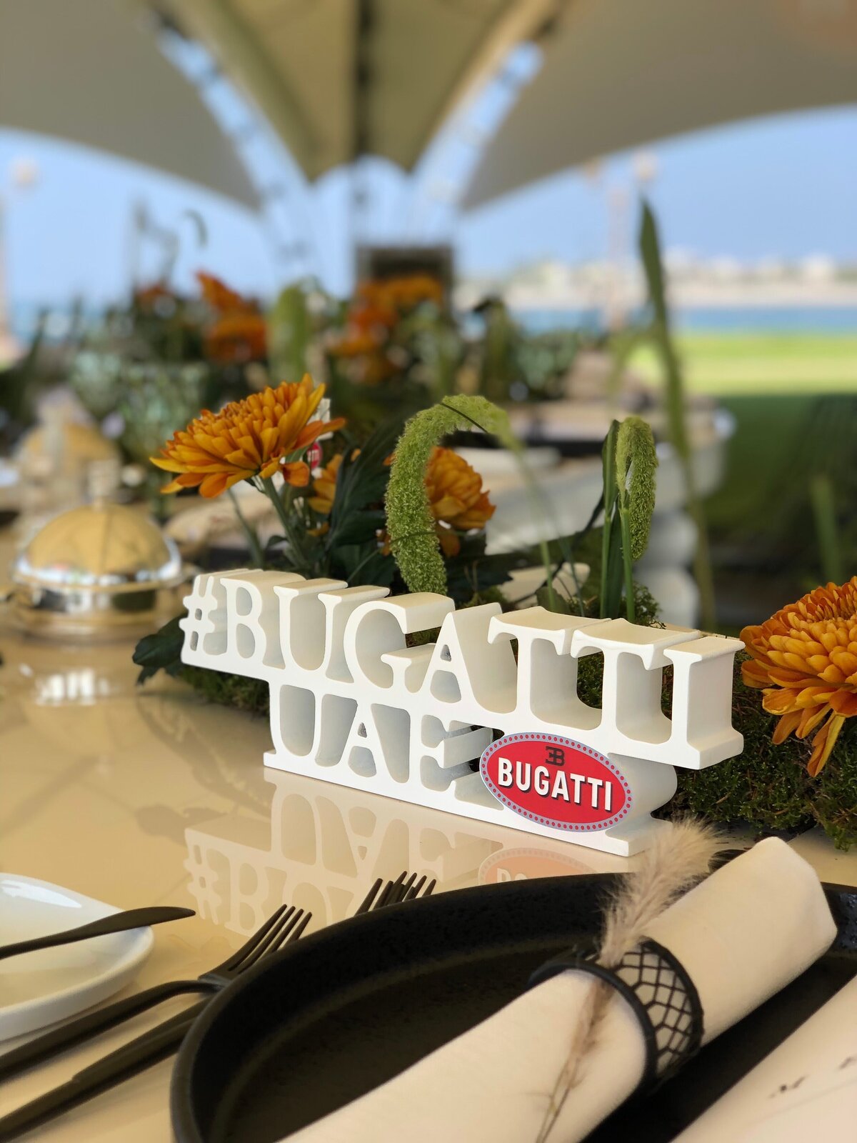 rock-your-event-corporate-event-design-planning-styling-dubai-UAE-Bugatti-driver-luncheon