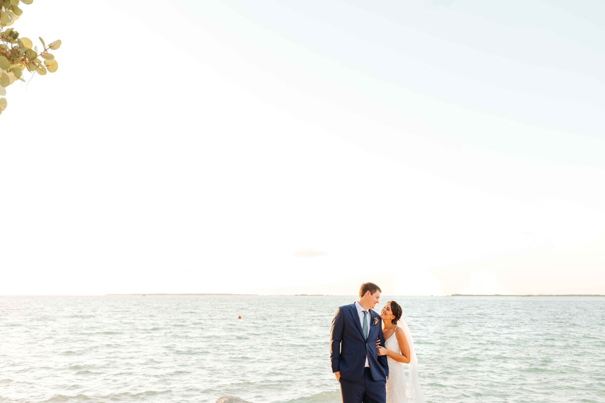 A bride and groom on the beach at their Key Largo wedding