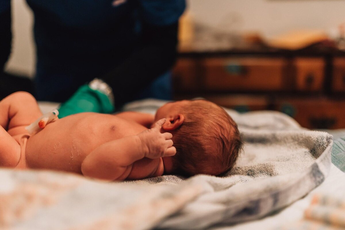 spokane-home-birth-baby+photo+on+bed+