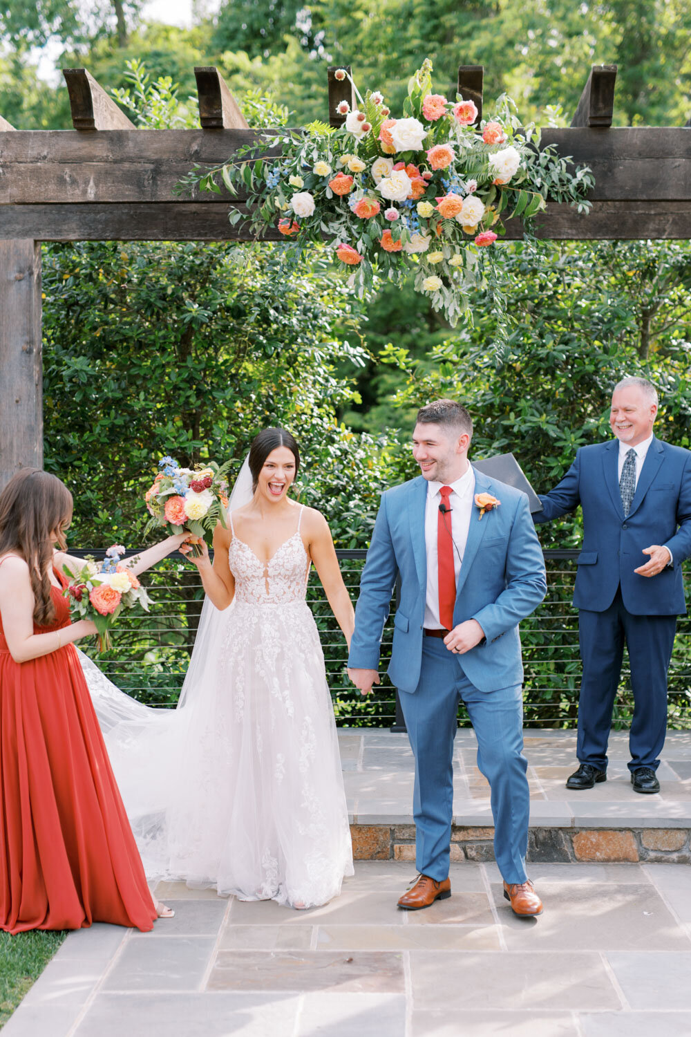 Married couple in front of the wedding altar