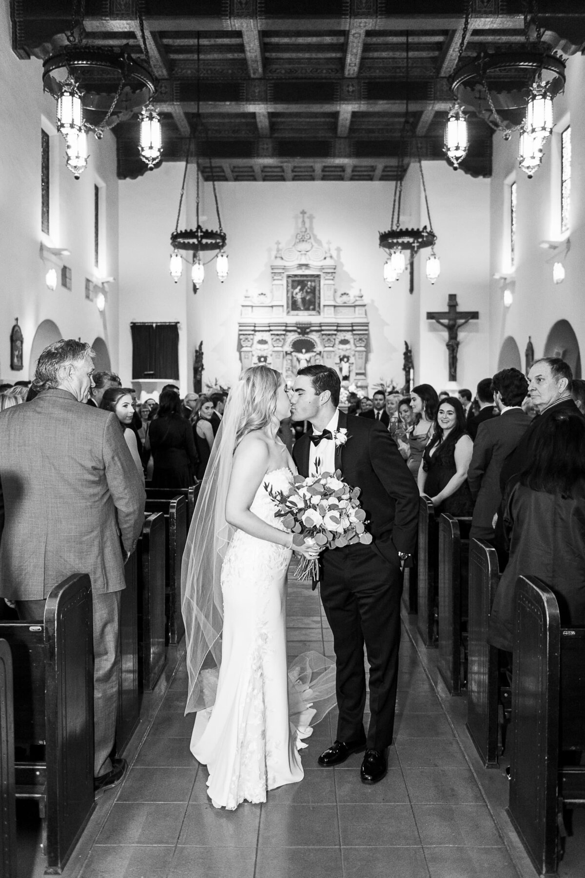 Scottsdale-Wedding-Photographer-Brophy-Chapel-Bride-Groom-Ceremony-Kiss-1406