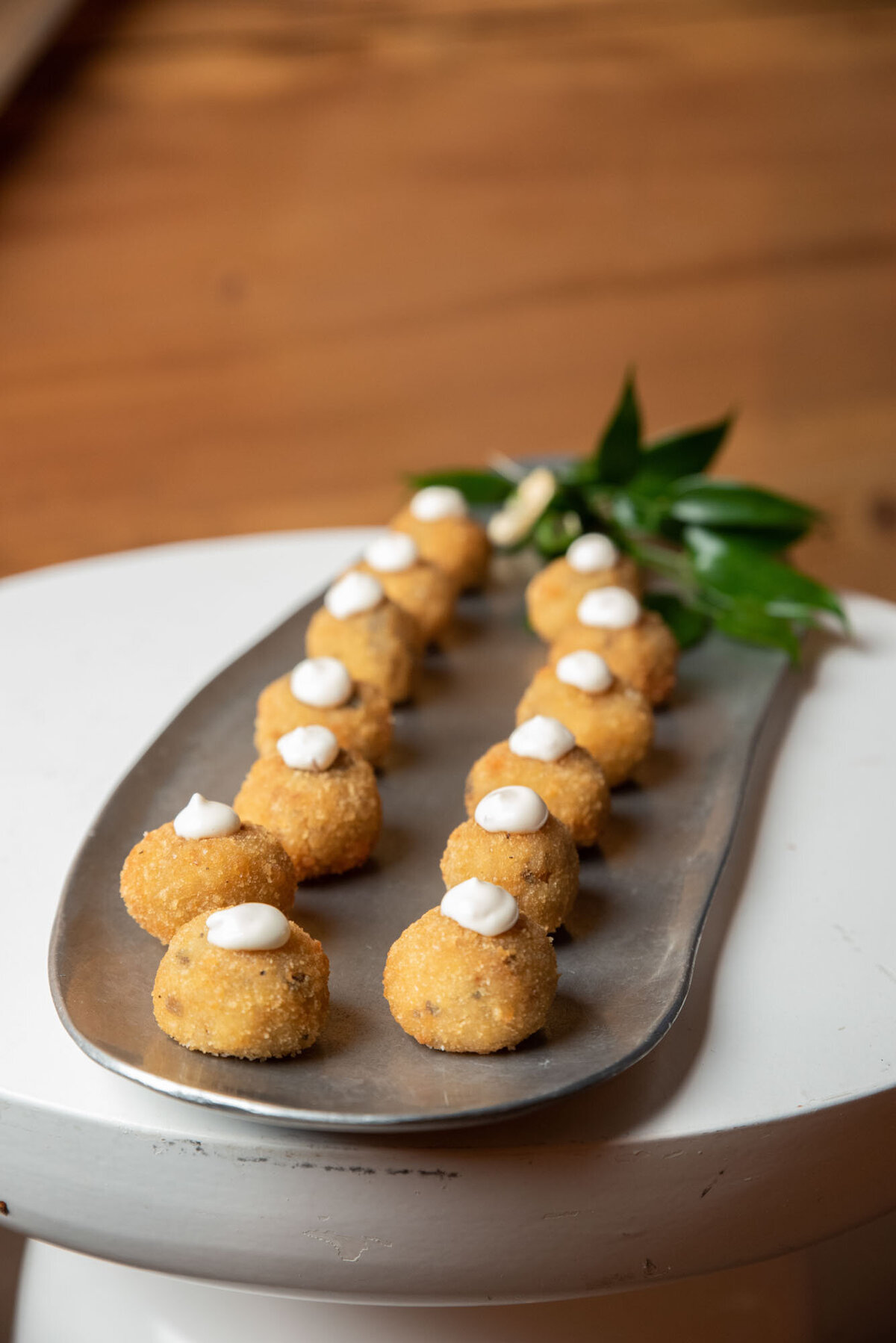 A tray of food with whipped cream on top