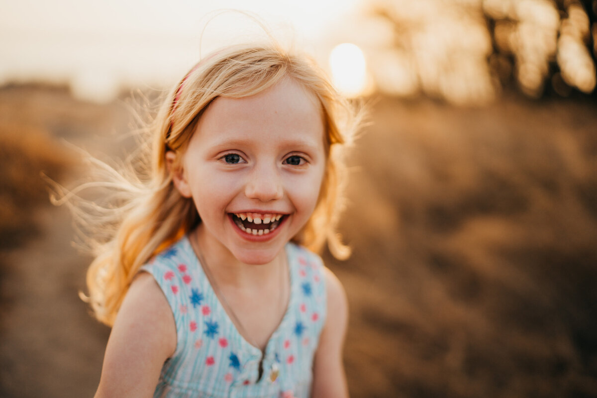 young-girl-smiling-towards-camera-for-her-portrait