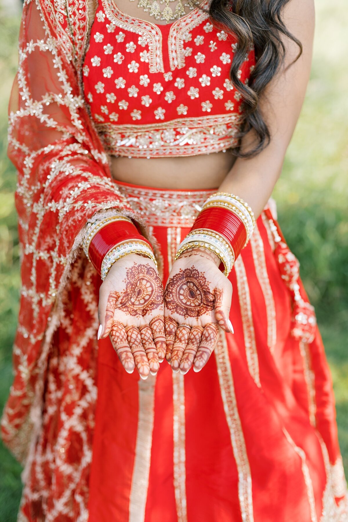 Indian bride with Mehndi on hands