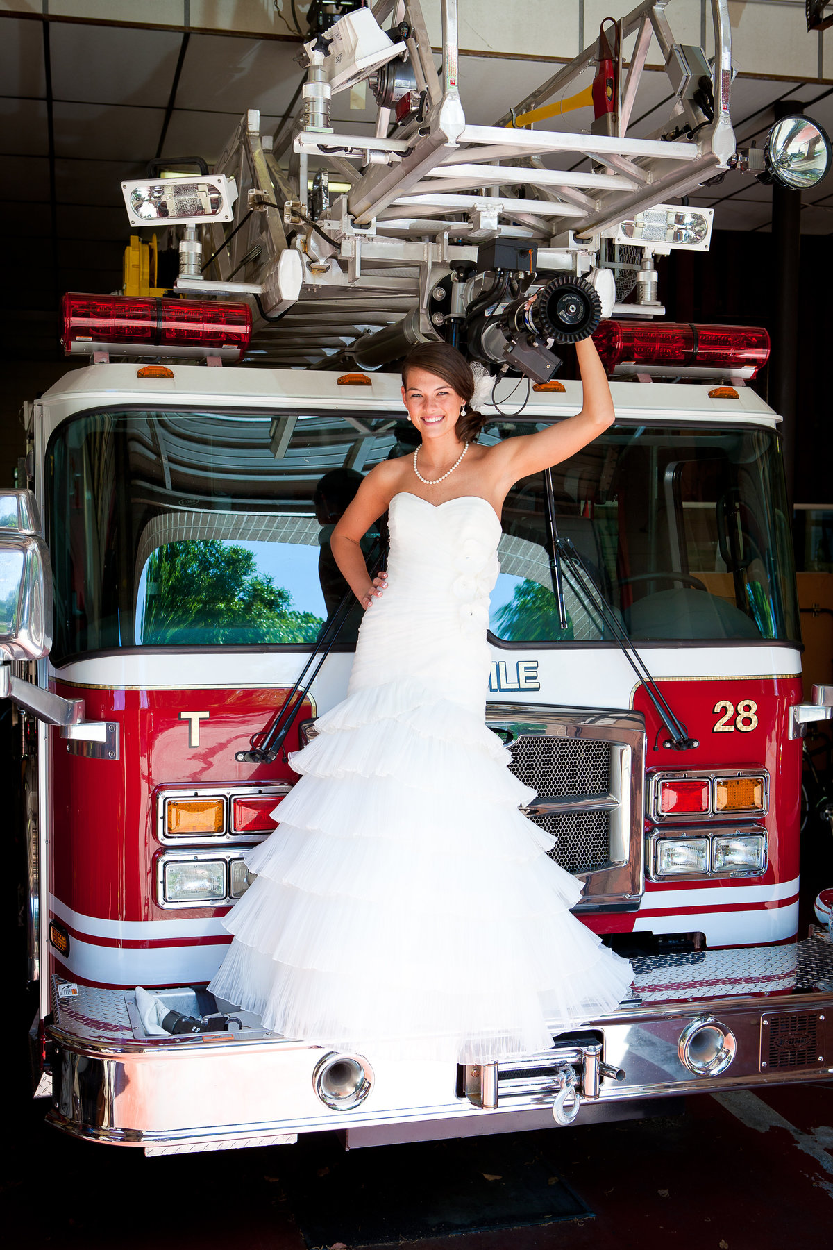 The bride was marrying a fireman so she decided to do her bridals at a fire station in midtown Mobile, Alabama.