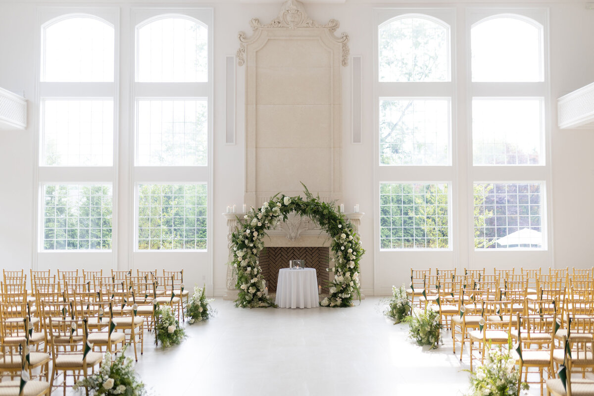 aisle-decor-white-green-flowers-archway-ceremony-flowers