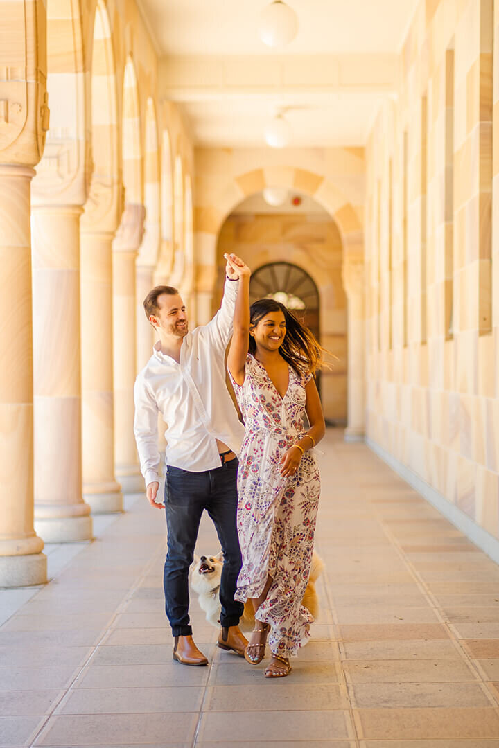 couple having engagement photos done in uq st lucia campus brisbane