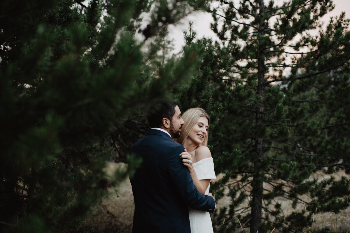 Photographers Jackson Hole capture forest bridals with bride and groom