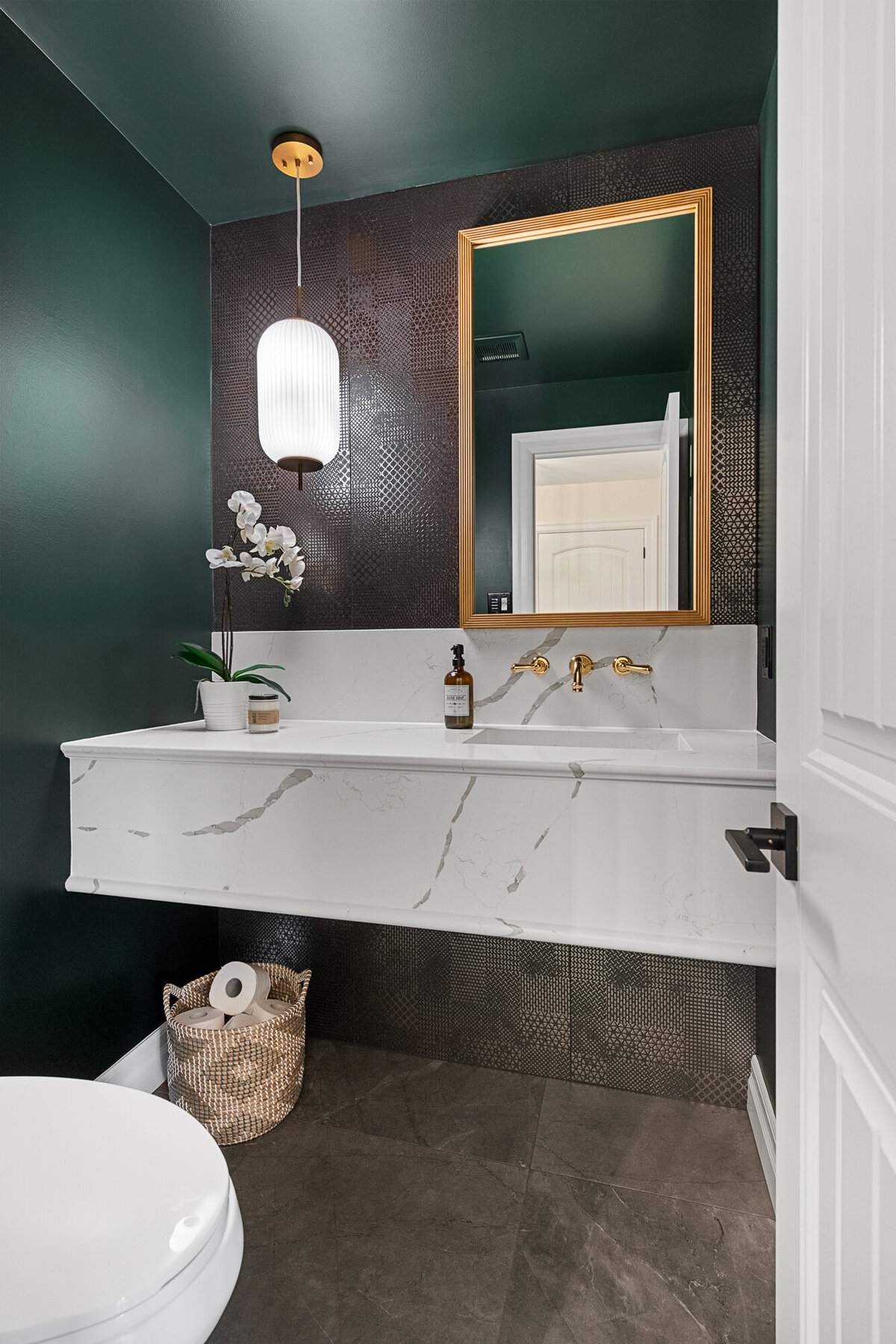 Final image of our moody luxe powder room interior design project.