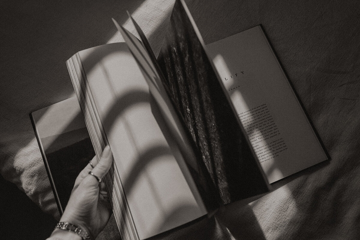 flipping through a wedding photo book