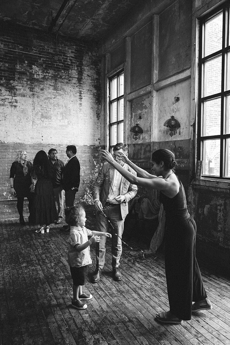 Mira Park Photography NY based wedding photographer Black and white photo of wedding tea ceremony at Greenpoint Loft in Brooklyn NY