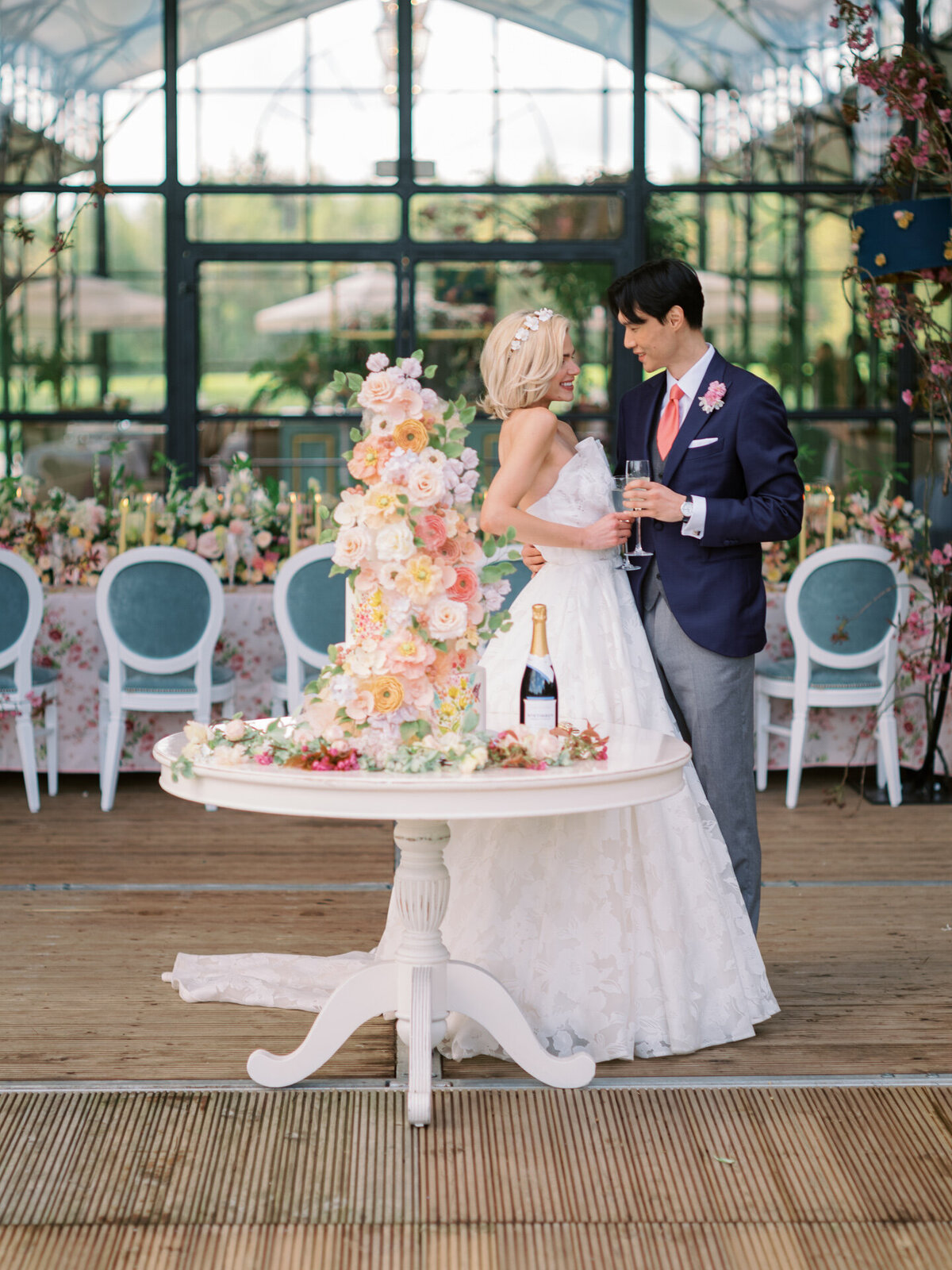 bride and groom cutting the cake