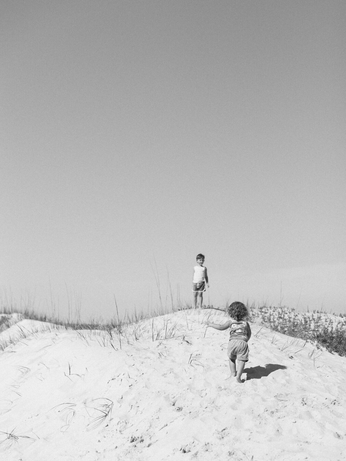 kids-playing-on-dunes
