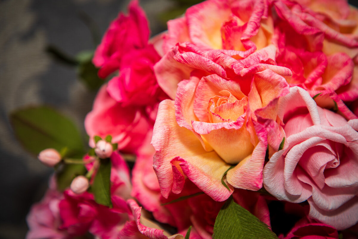 Vibrant pink roses and hypericum paper wedding bouquet