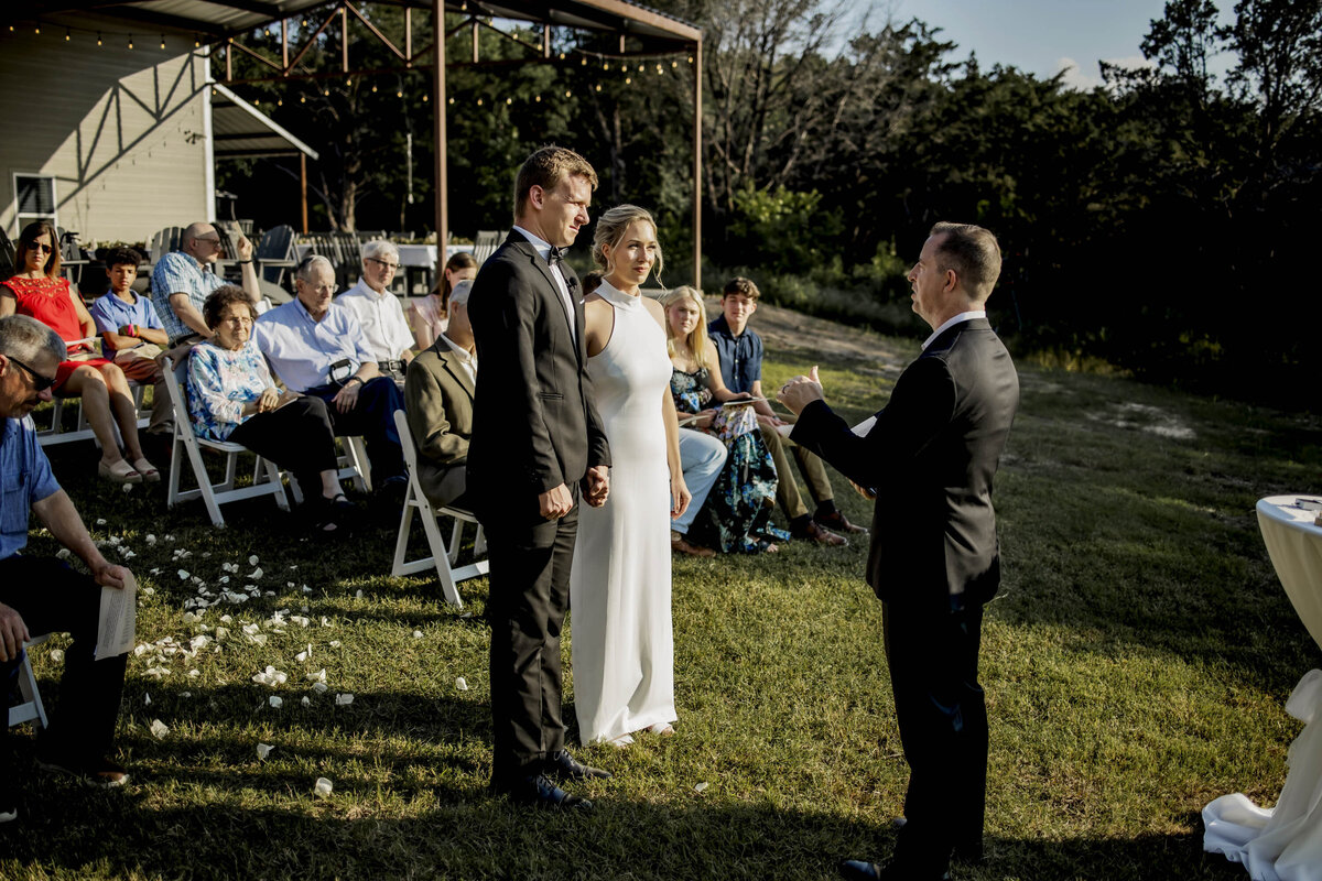 a bride and groom during the ceremony