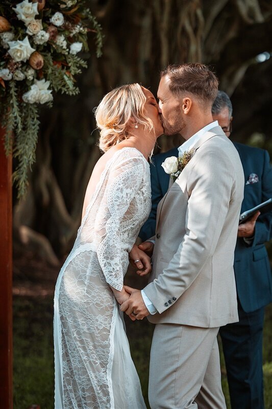 Celebrate the enchanting moment when Maddi and Jeremy shared their heartfelt wedding kiss! Immerse yourself in the love and joy of this magical union as you explore the captivating highlights of their special day.