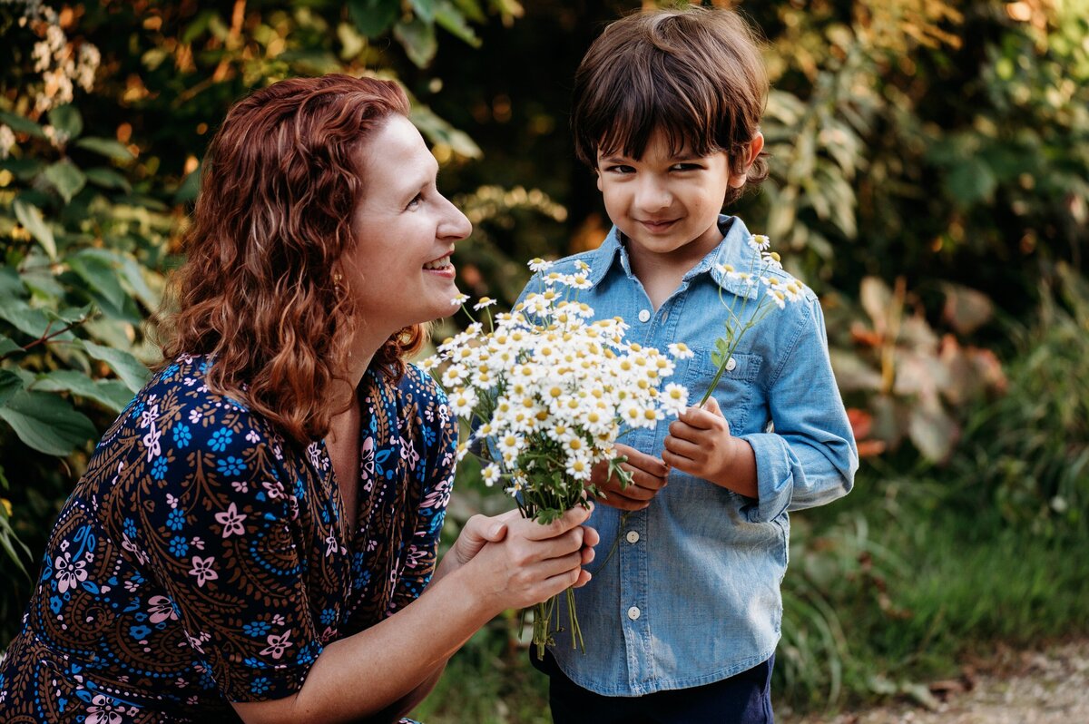 Mom and son with flowers McKennaPattersonPhotography