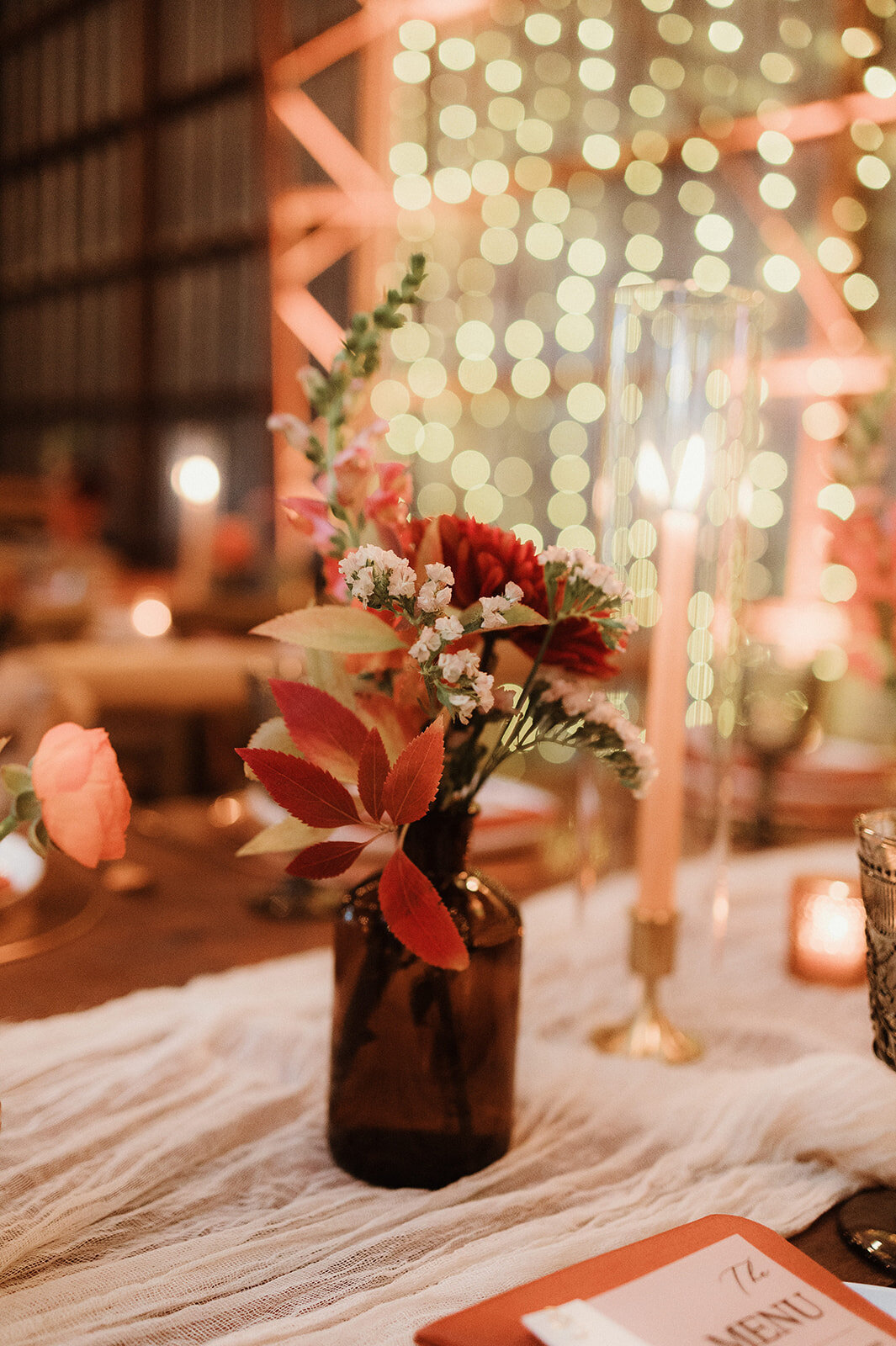 Boho bud vase florals and terracotta accents at a Hudson Valley winery venue

