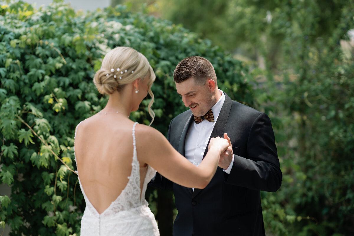 film style wedding photography of bride and groom first look