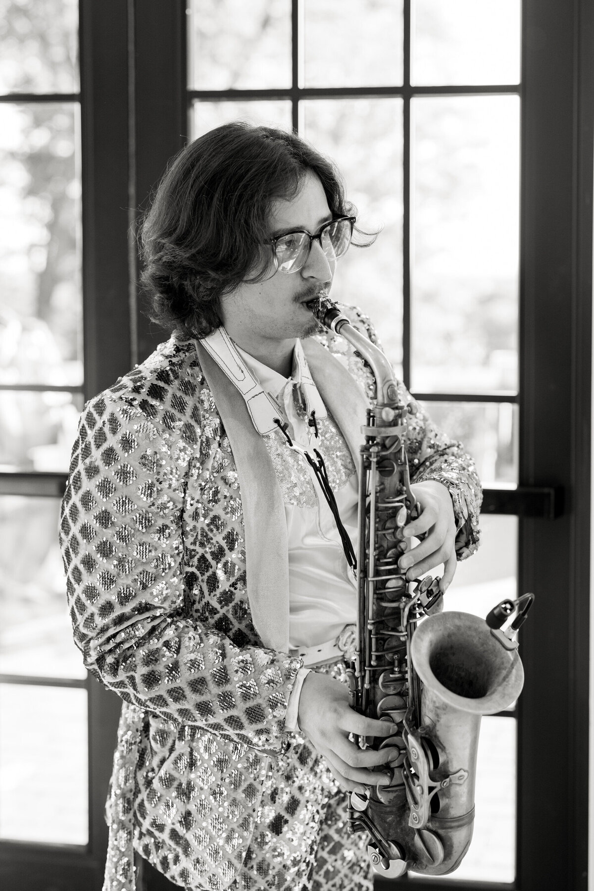 that saxophone guy playing at pendry natirar cocktail hour