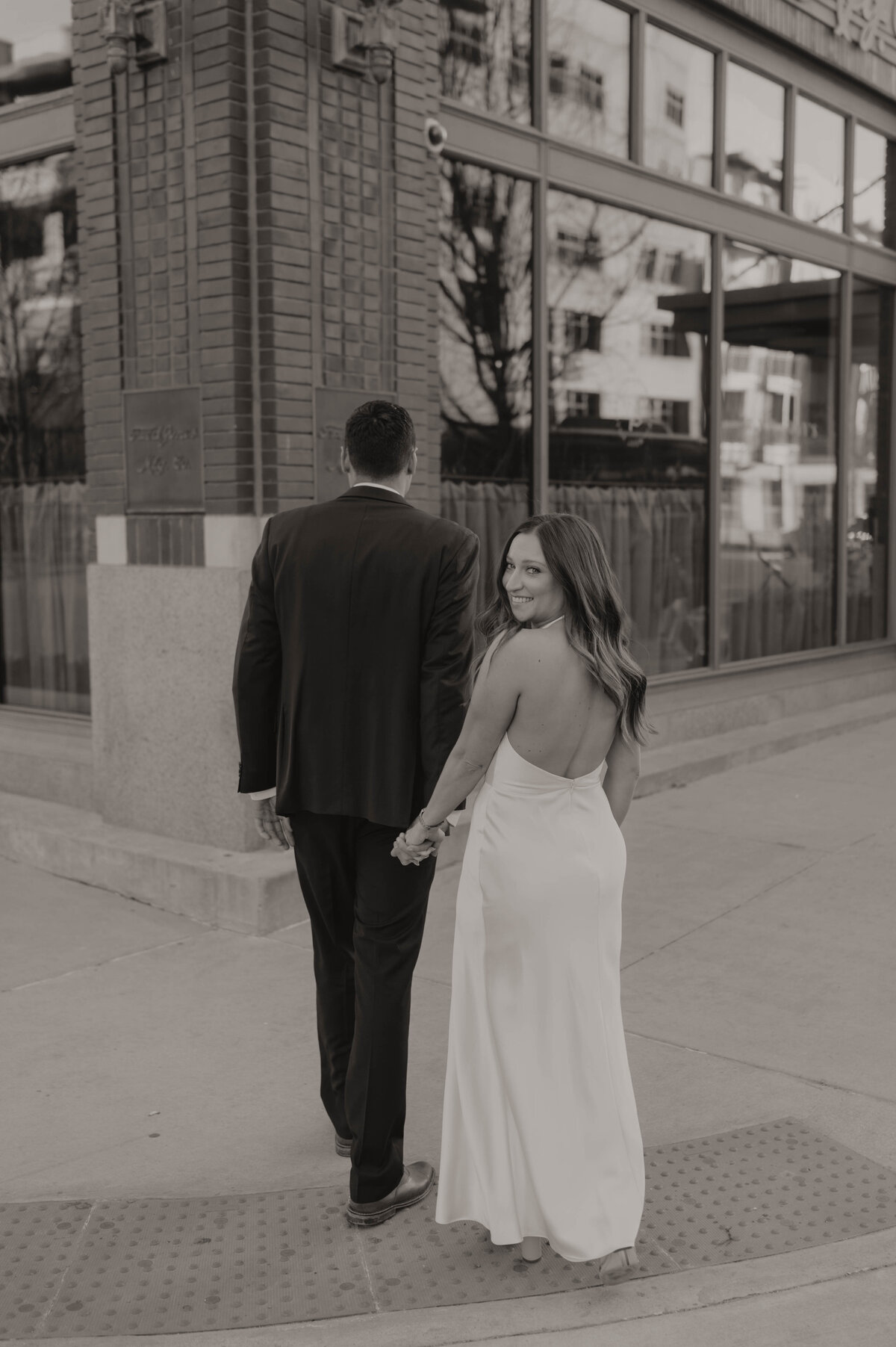 couple walking in front of fordson hotel in oklahoma city