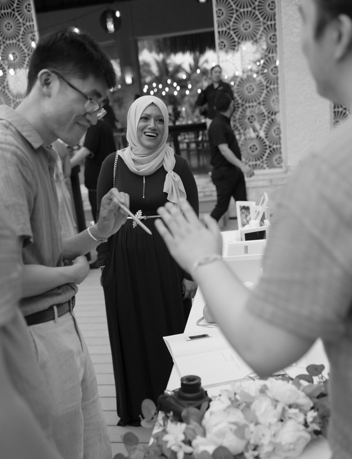guests laugh, cocktail hour, destination wedding in Mexico