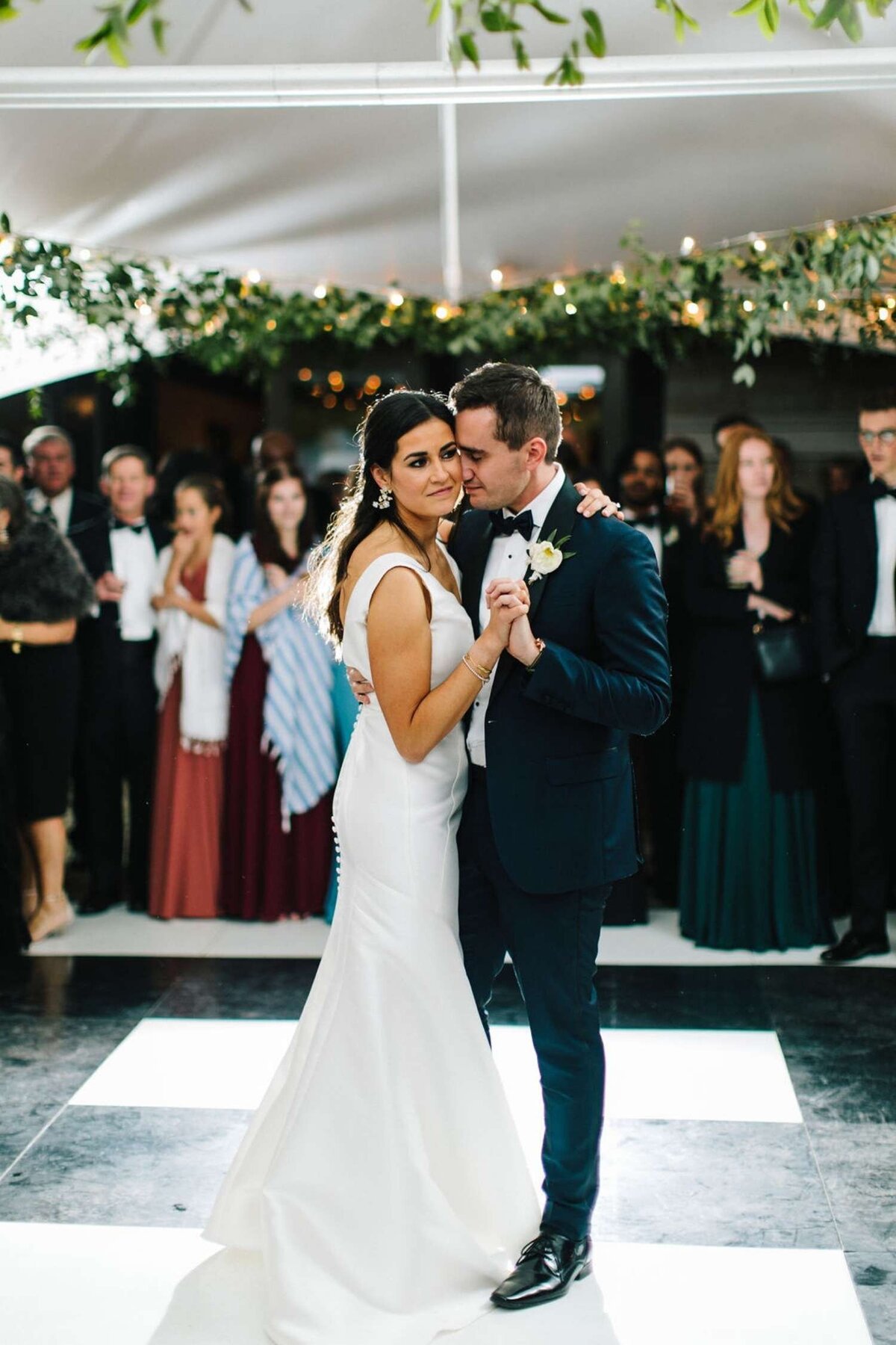 Classic and Elegant Black and White Wedding First Dance under the Tent at a Luxury Michigan Lakefront Golf Club Wedding.