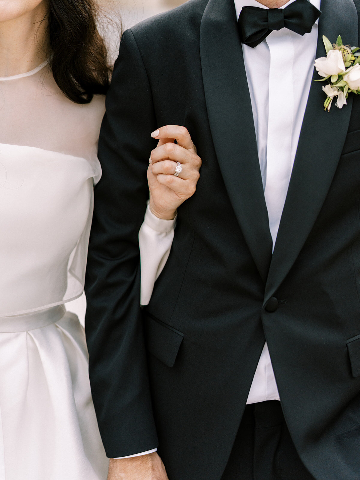 This romantic summer solstice wedding held at the elegant War Memorial was filled with pops of cherry red, pink and white flowers and lush greenery. Floral Design by Rosemary and Finch in Nashville, TN.