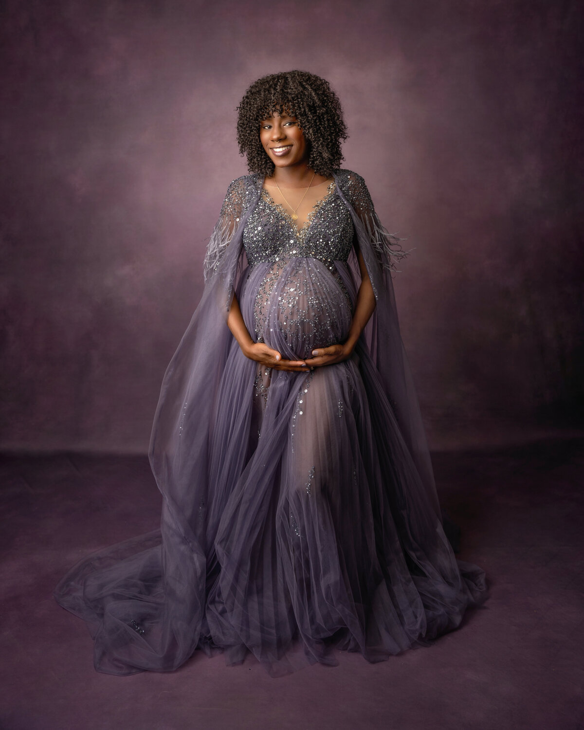 black purple woman natural hair pregnant belly maternity studio before and ever