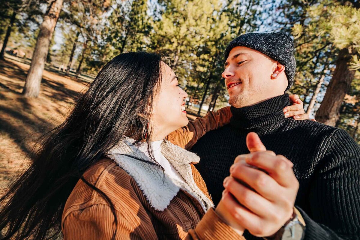 Missoula couple dancing outside in the forest