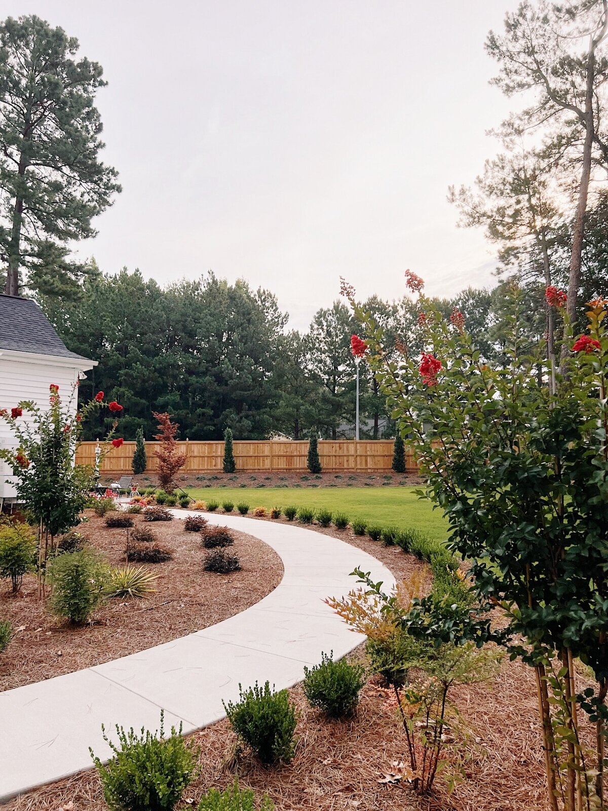 Cap and Trim Wood Fence in College Grove