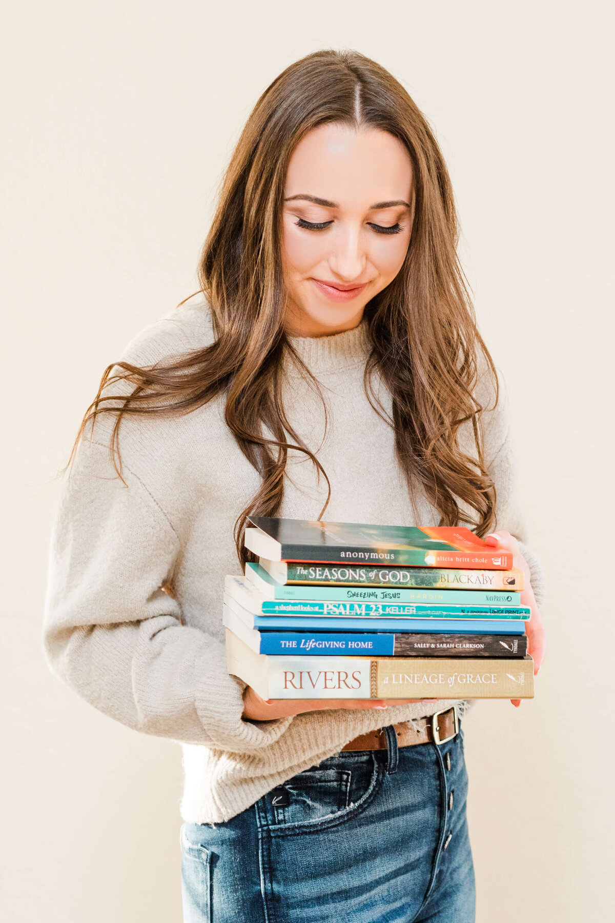 Woman Holding Recommended Books