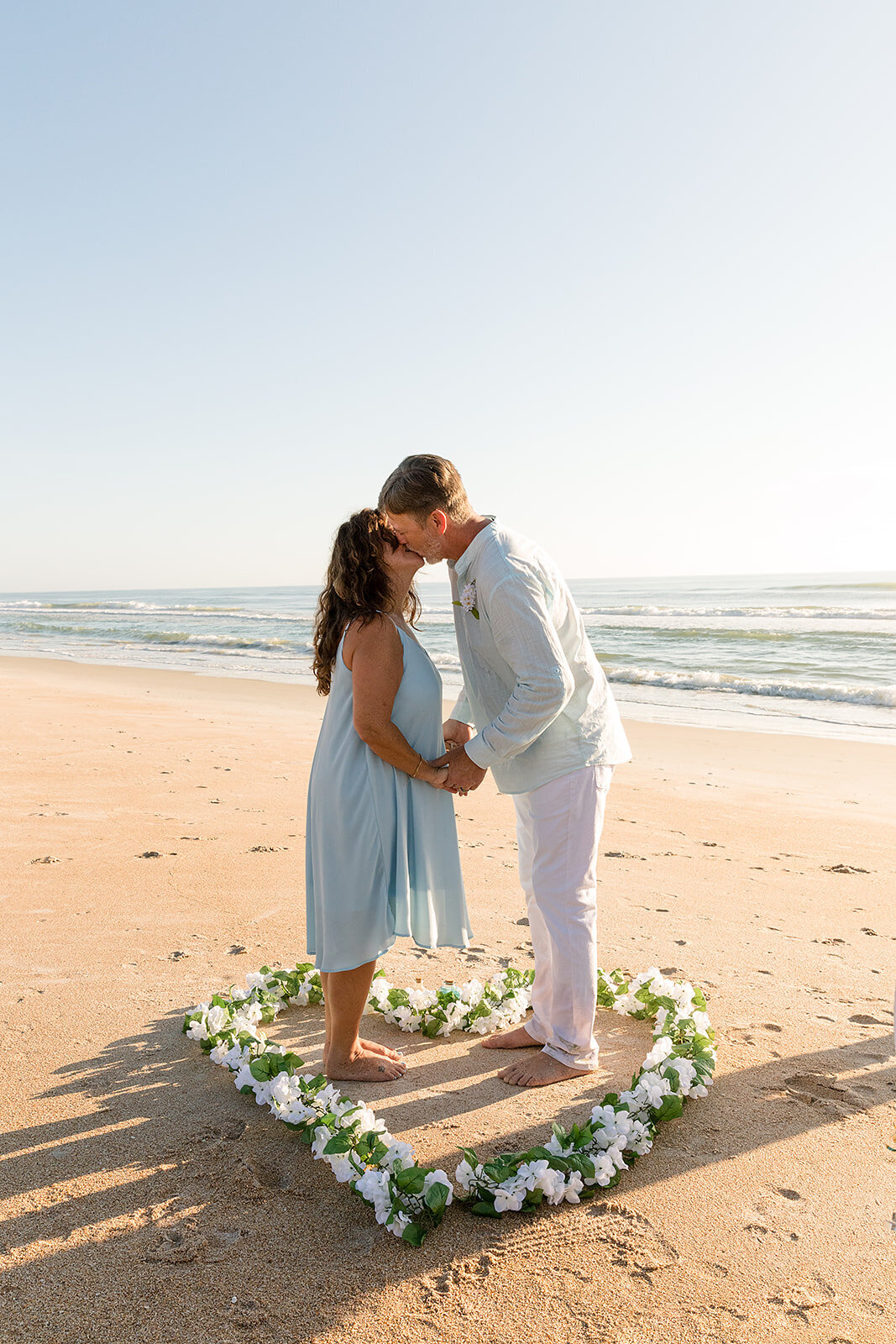 eloping at sunrise on the beach