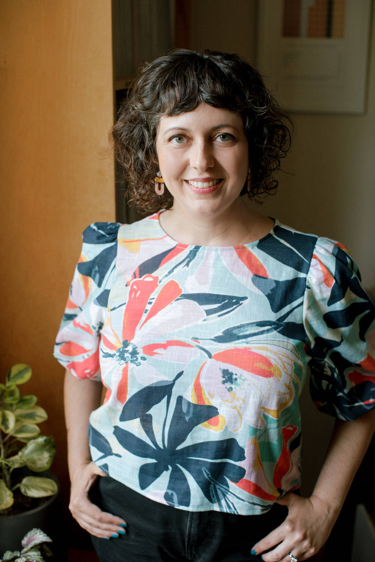 portrait of author nicole Haroutunian wearing a floral blouse