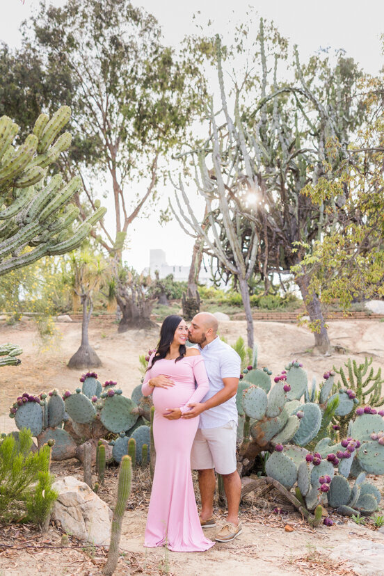 man and pregnant wife cactus garden san diego