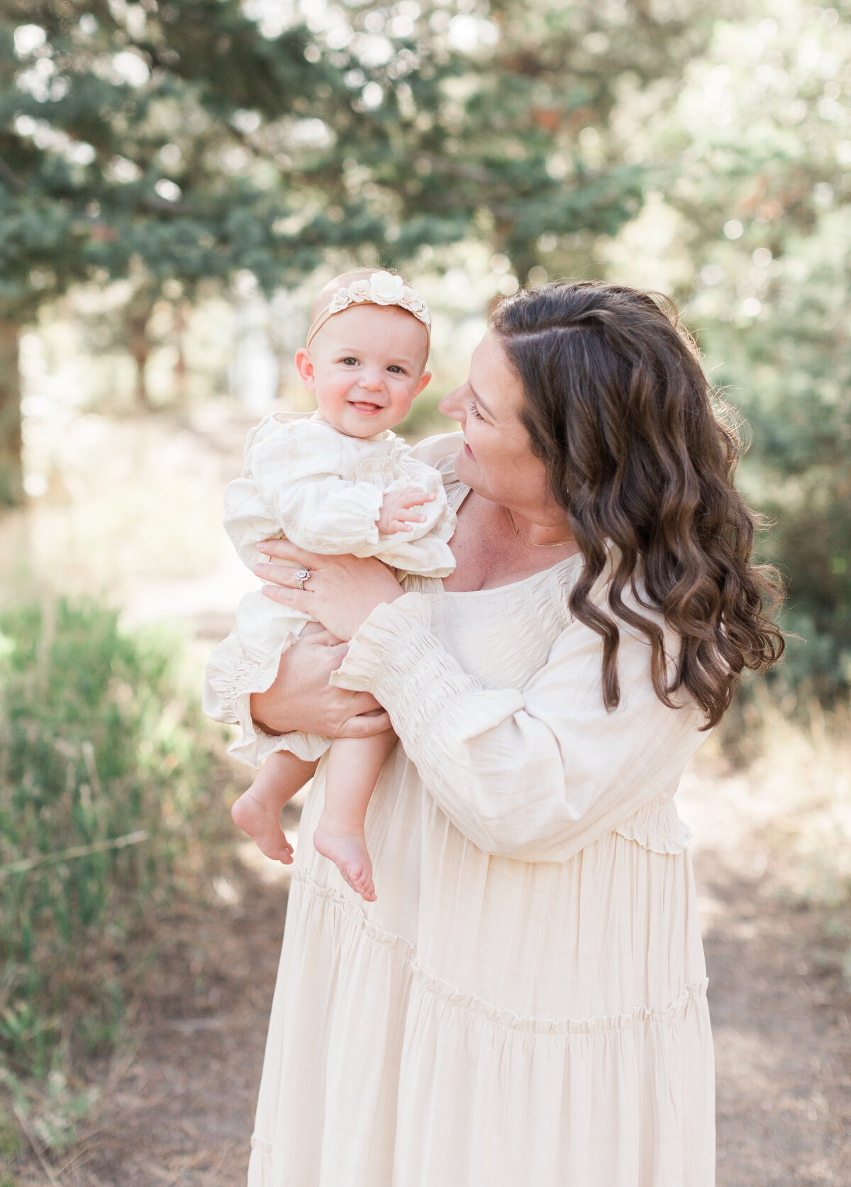 Mom and baby during their family photos at golden hour