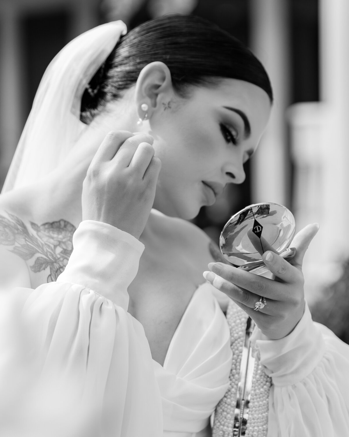 bride-checking-makeup