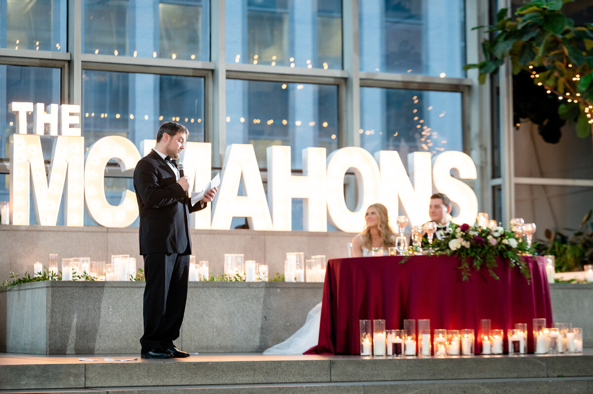 large light up letters behind a wedding couple head table at their wintergarden ppg wedding reception in pittsburgh