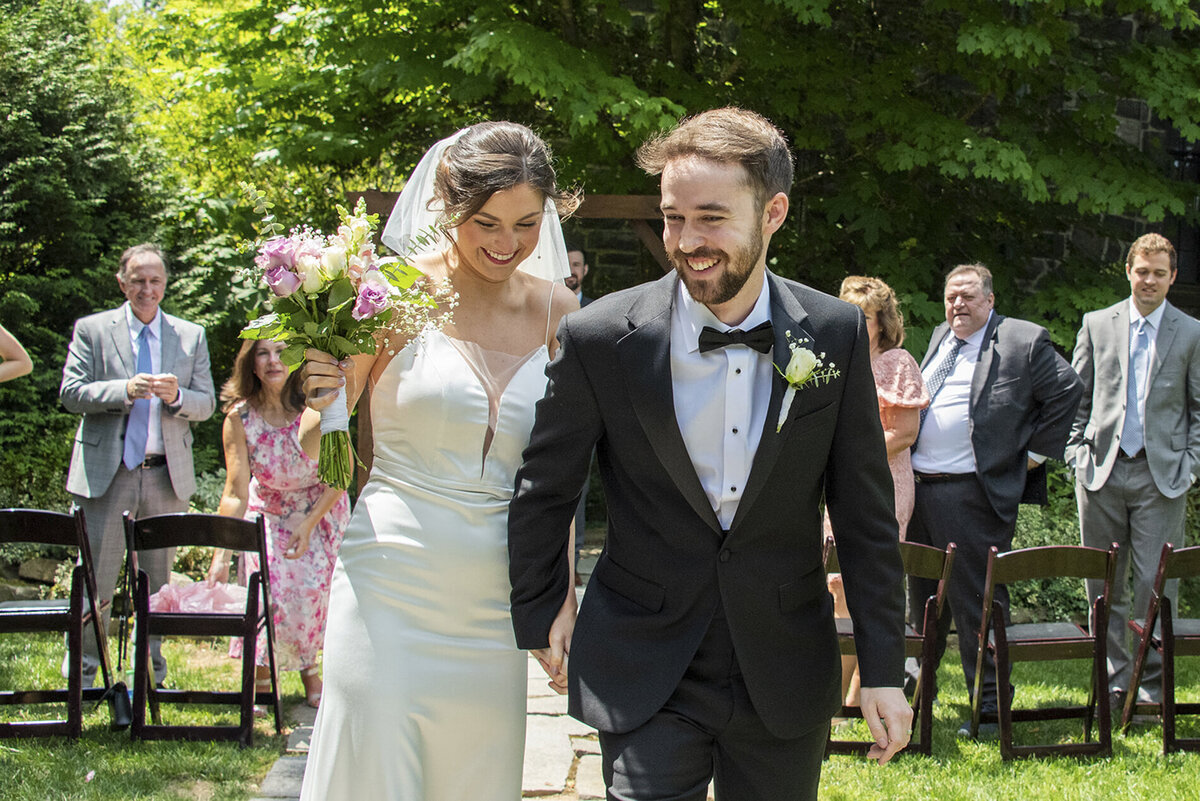 Couple walking down aisle at Homewood Asheville