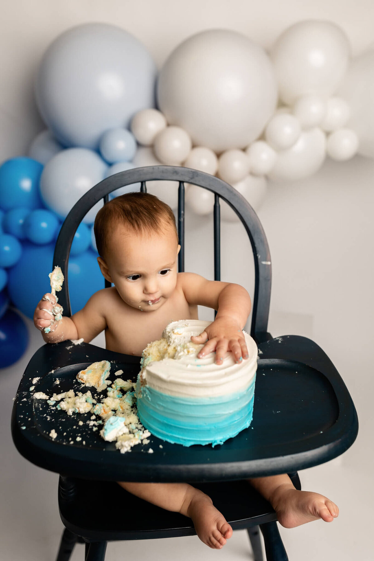 NWA cake smash photographer, milestone portrait session, baby birthday photoshoot Northwest Arkansas, best cake smash photography near me Fayetteville AR