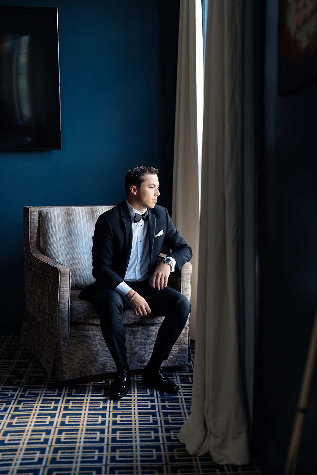 groom-getting-ready-delamar-west-hartford
